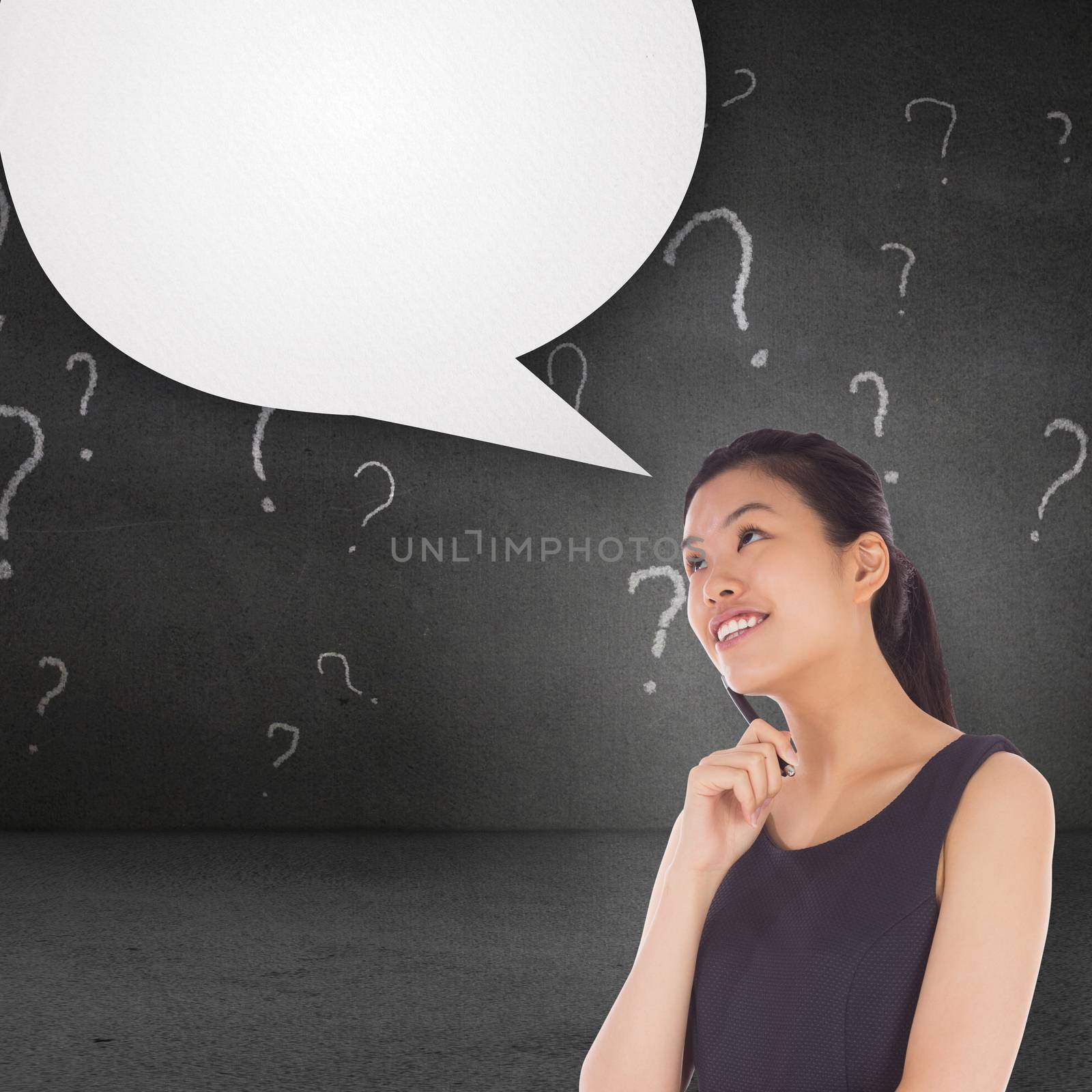 Thinking businesswoman against speech bubble