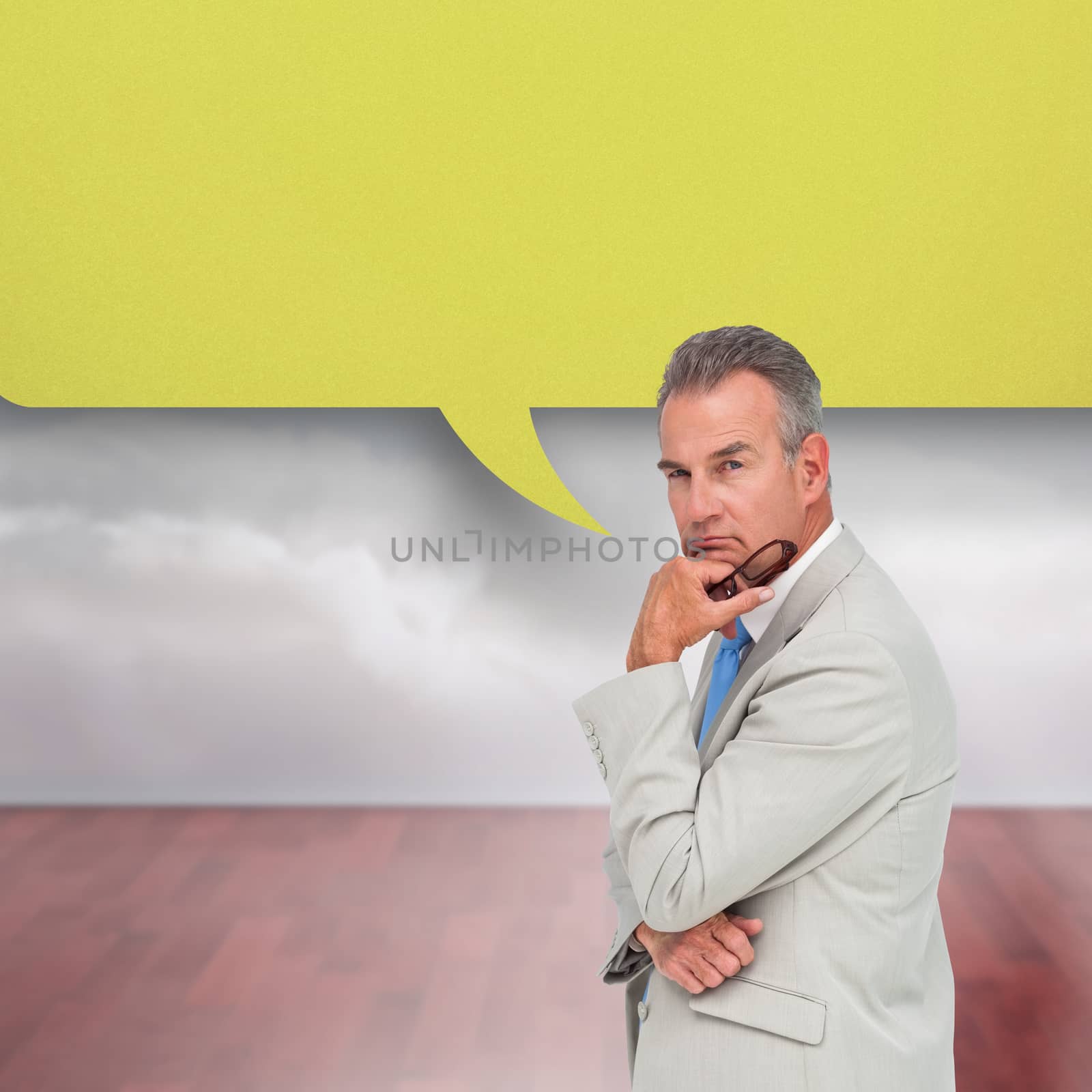 Composite image of thinking businessman with speech bubble by Wavebreakmedia