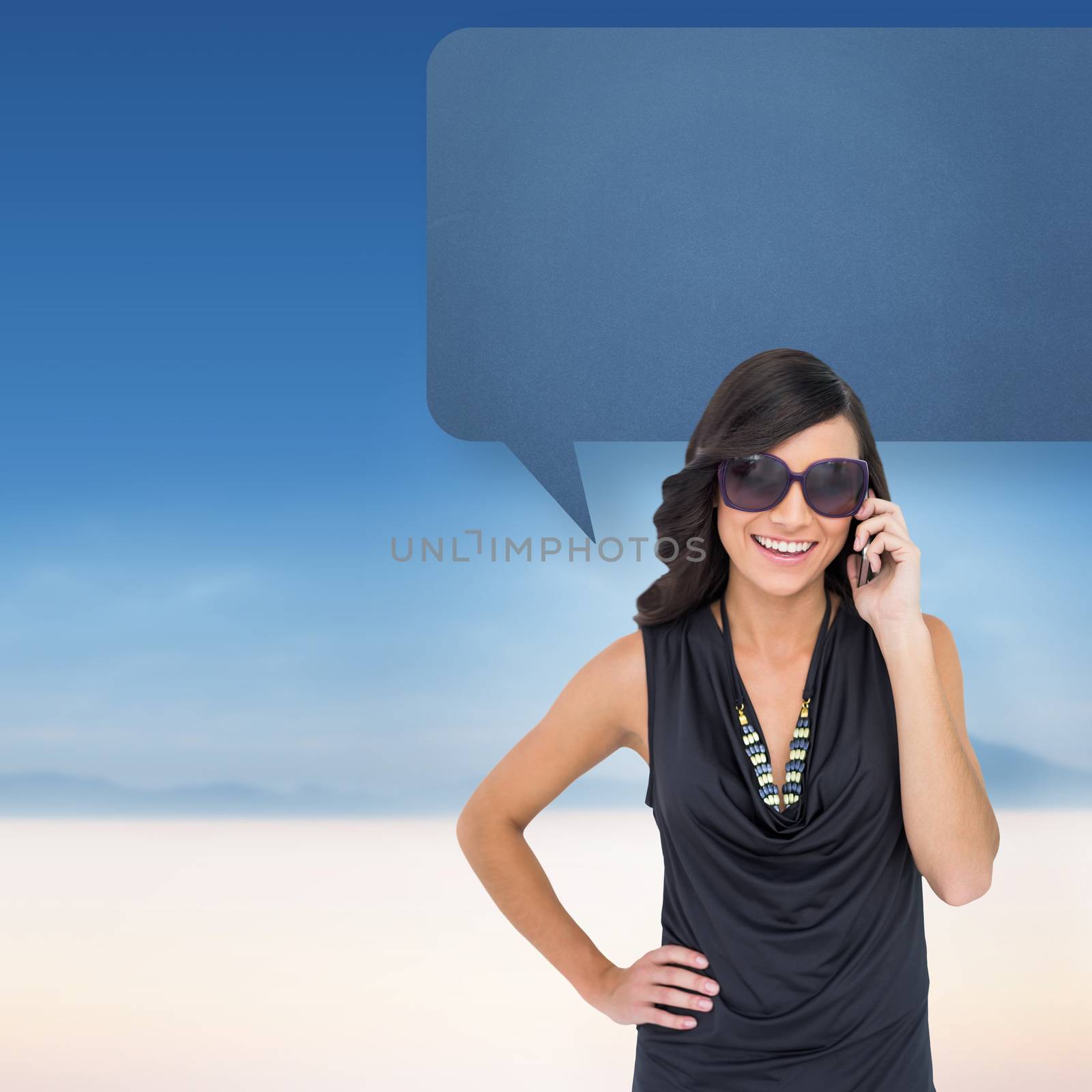 Composite image of happy brunette phoning with speech bubble by Wavebreakmedia