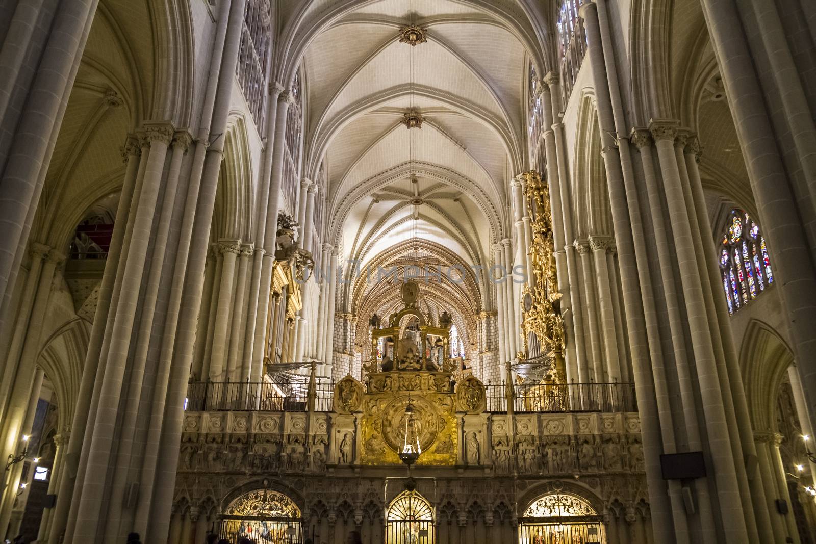 Interior of Toledo Cathedral. Arcs, organ, columns and gothic art. Spain