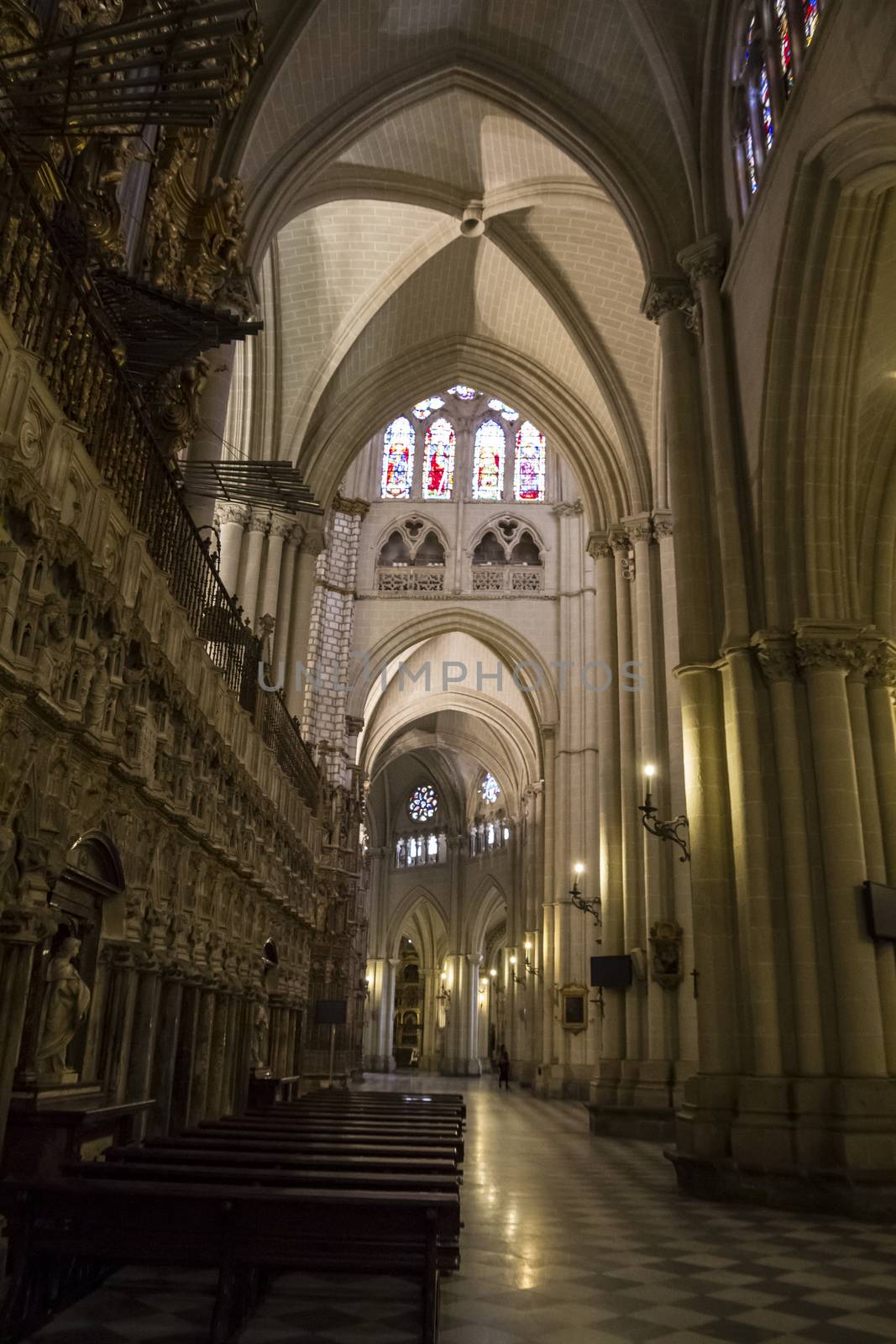 Interior of Toledo Cathedral. Arcs, organ, columns and gothic art. Spain