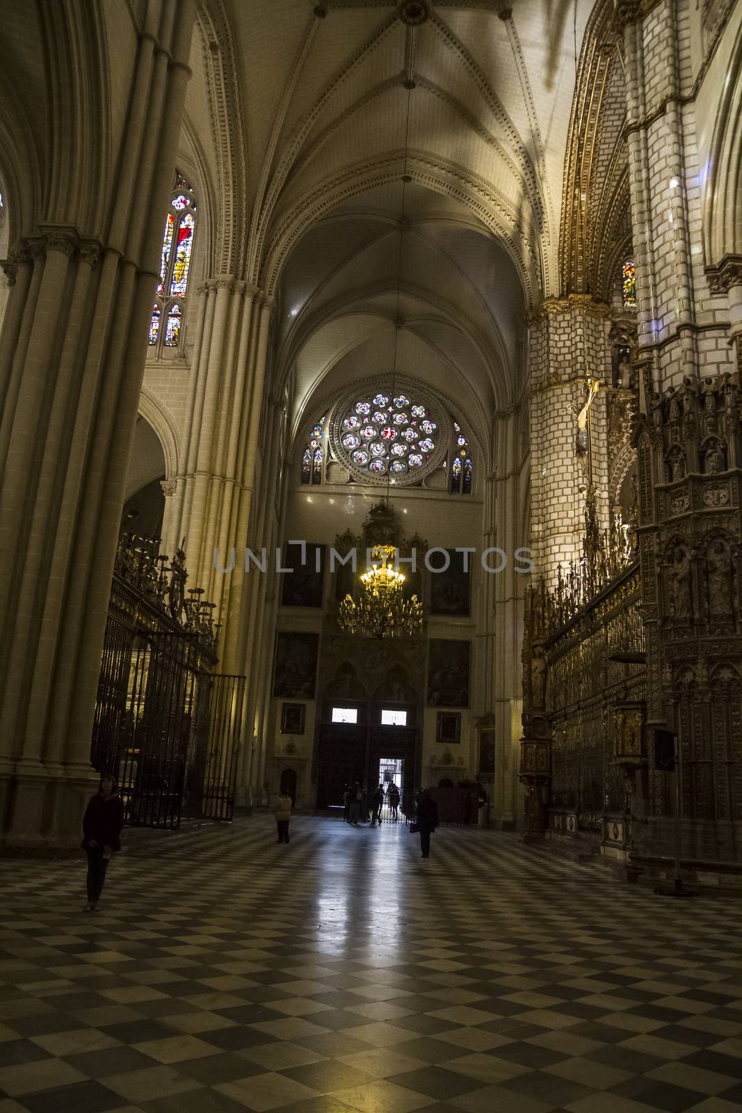 Interior of Toledo Cathedral. Arcs, organ, columns and gothic art. Spain