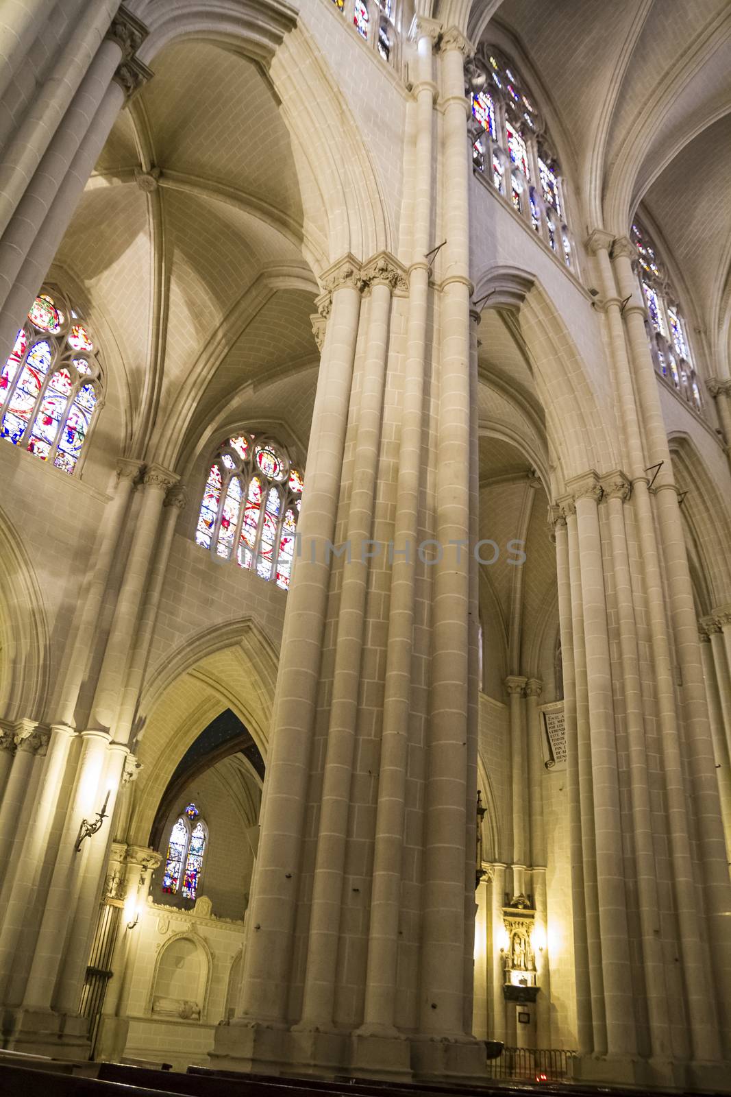 Interior of Toledo Cathedral. Arcs, organ, columns and gothic art. Spain