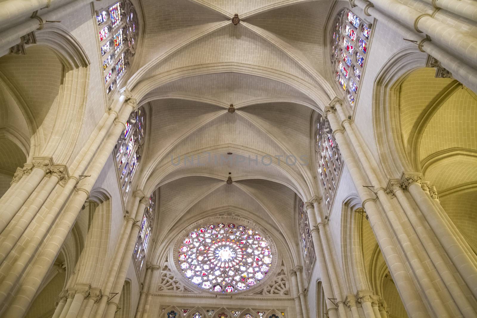 Interior of Toledo Cathedral. Arcs, organ, columns and gothic art. Spain