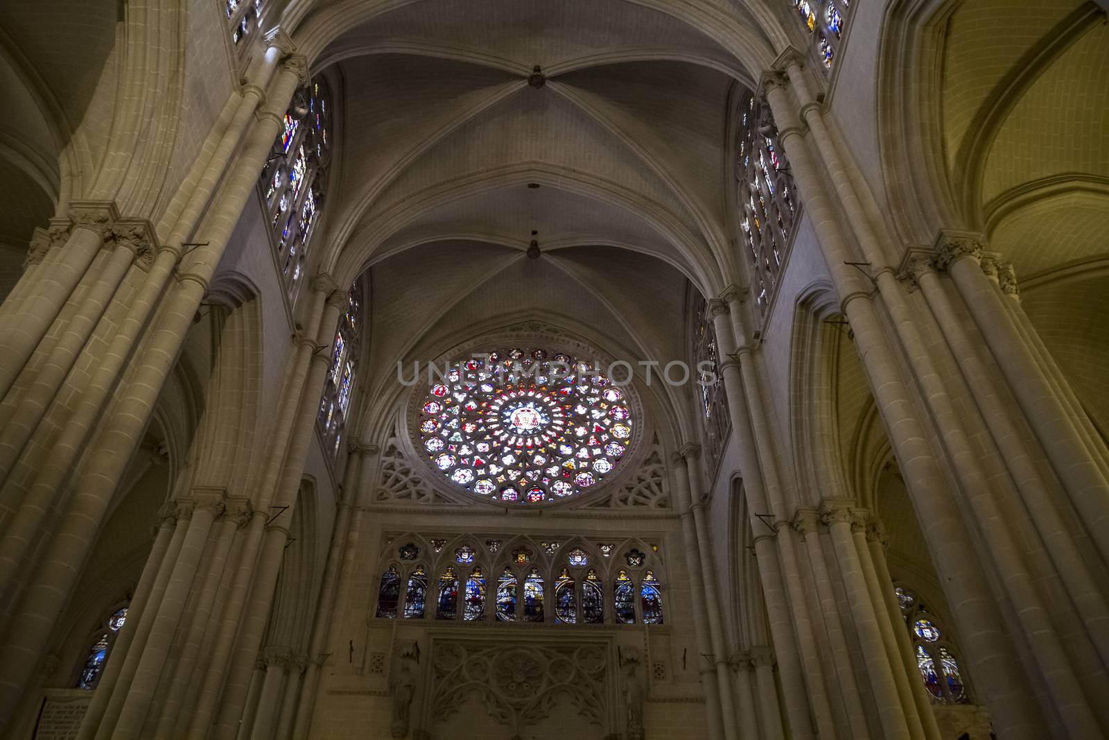 Interior of Toledo Cathedral. Arcs, organ, columns and gothic art. Spain