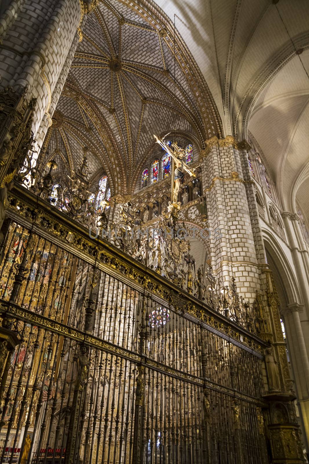 Interior of Toledo Cathedral. Arcs, organ, columns and gothic art. Spain