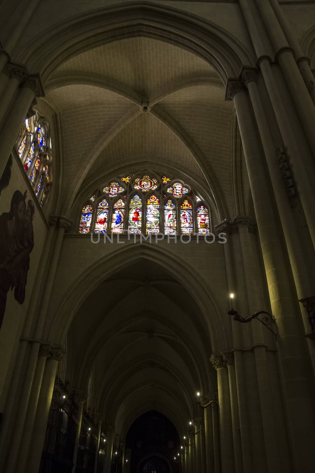 Interior of Toledo Cathedral. Arcs, organ, columns and gothic art. Spain