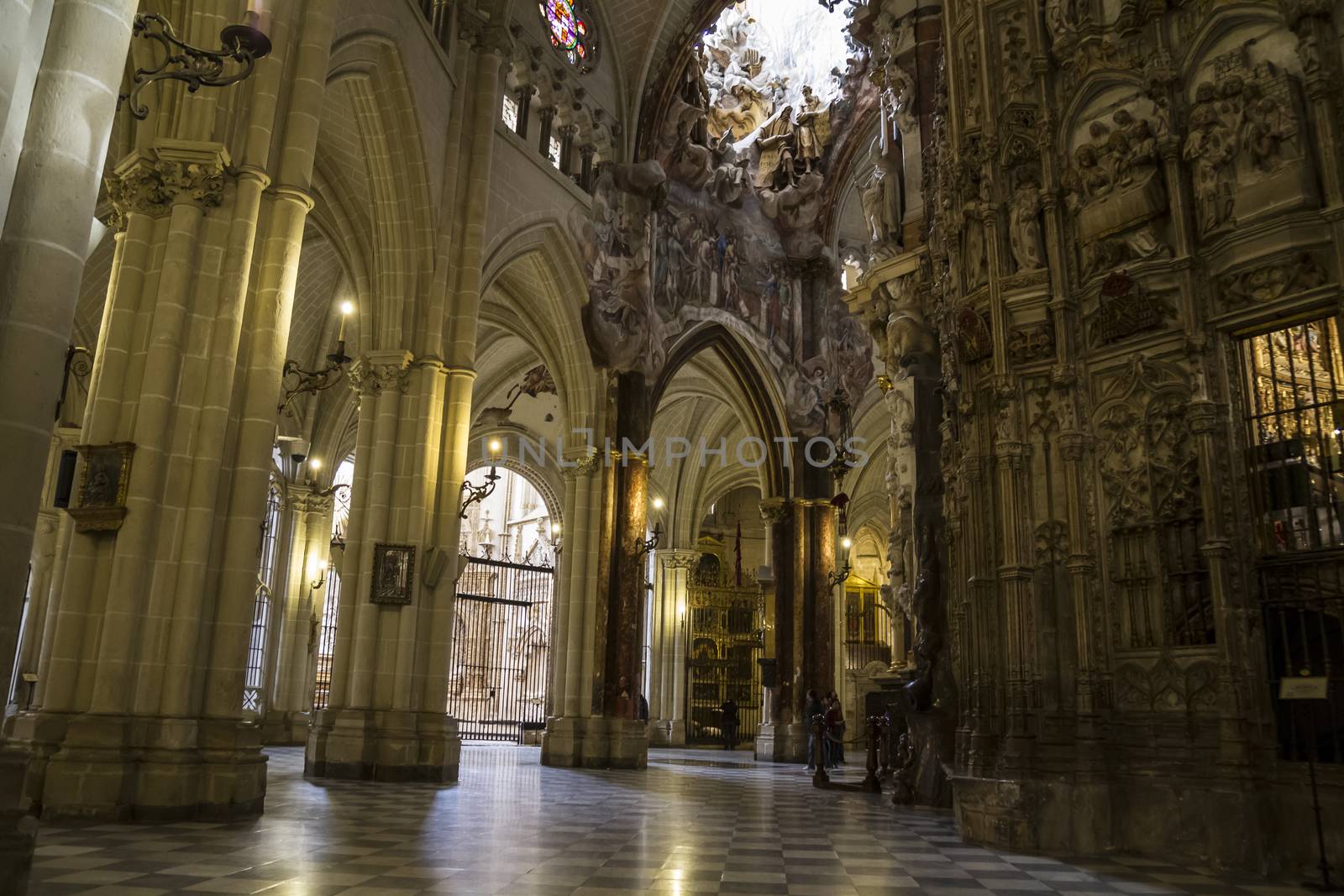 Interior of Toledo Cathedral. Arcs, organ, columns and gothic art. Spain