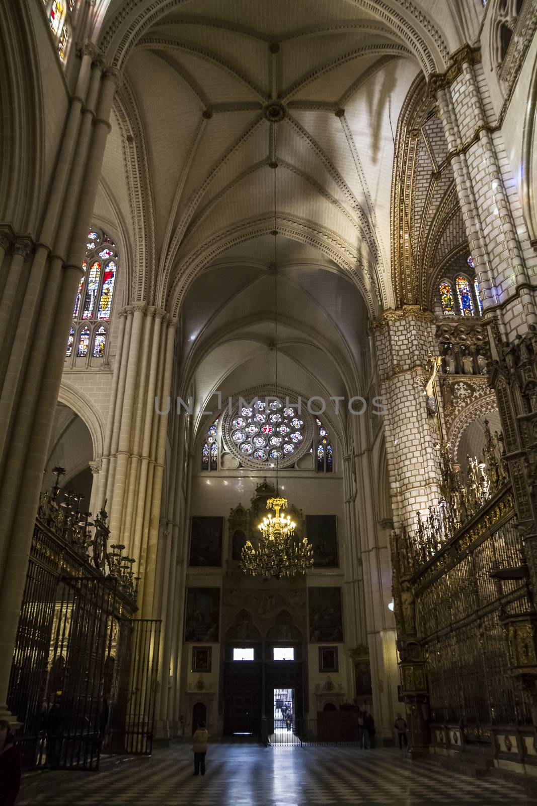 Interior of Toledo Cathedral. Arcs, organ, columns and gothic art. Spain