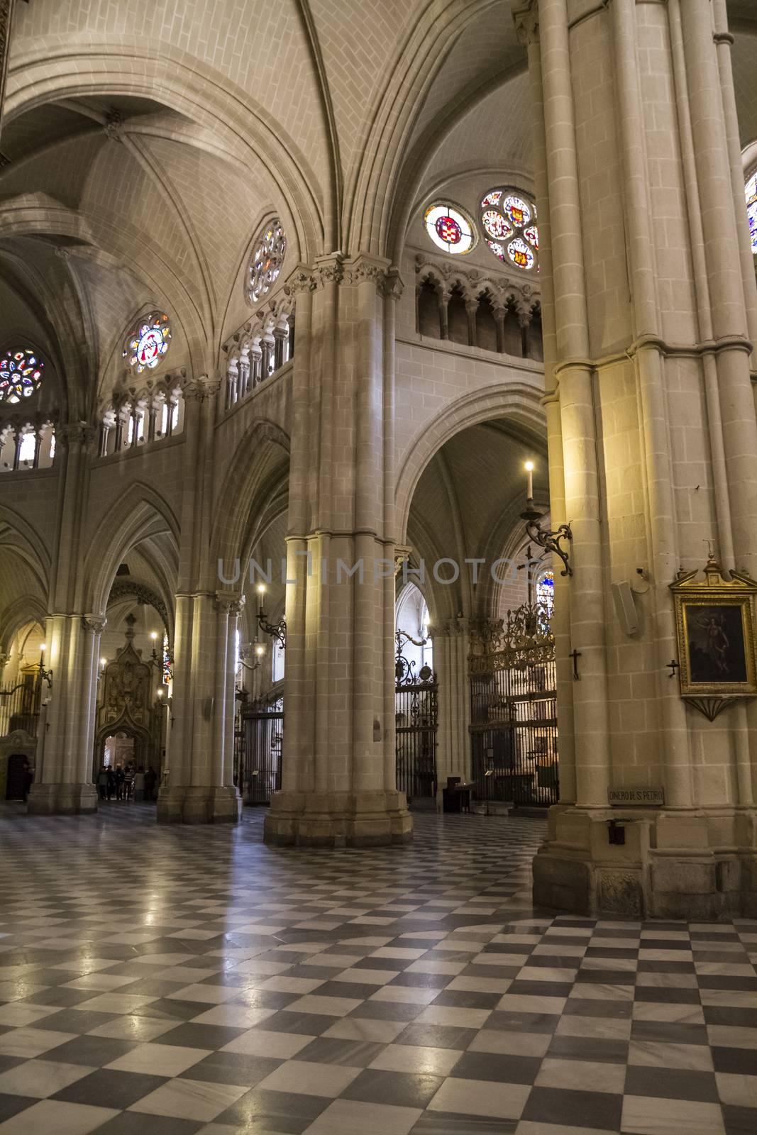 Interior of Toledo Cathedral. Arcs, organ, columns and gothic art. Spain