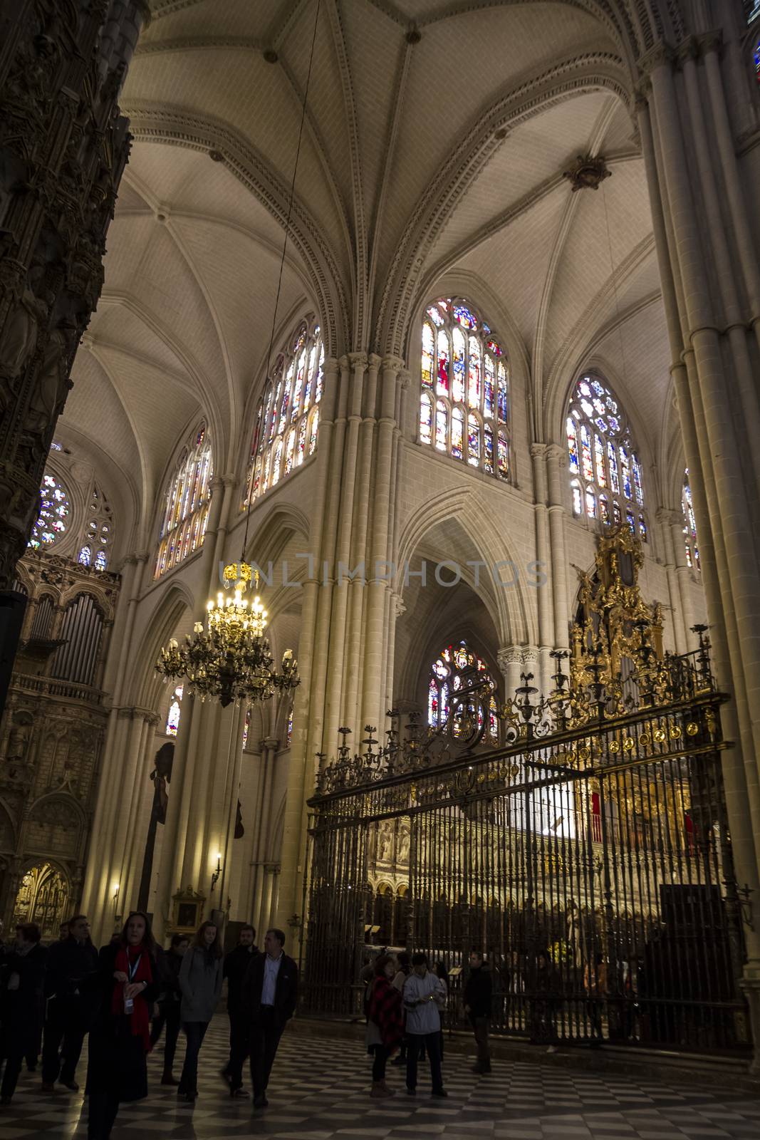 Interior of Toledo Cathedral. Arcs, organ, columns and gothic art. Spain