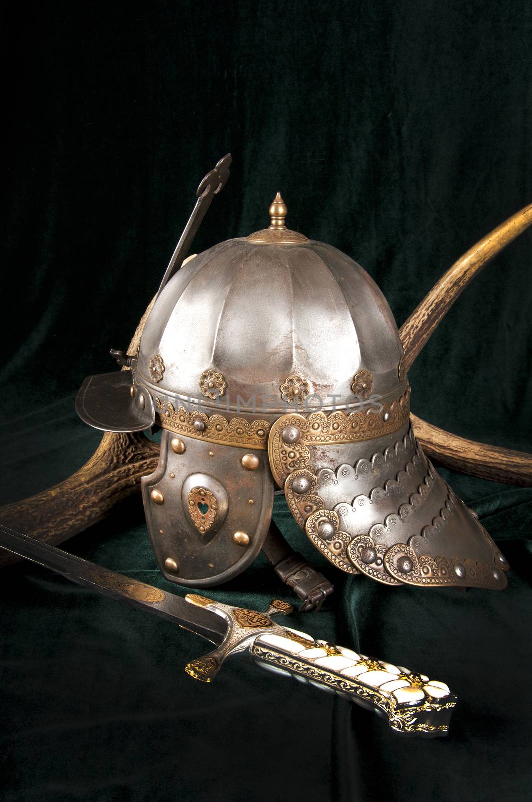 Iron helmet of the medieval knight. Very heavy headdress