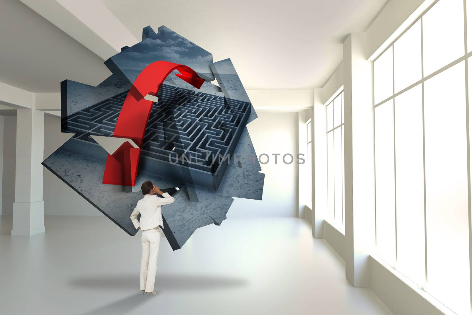 Thinking businesswoman against maze graphic on abstract screen in room