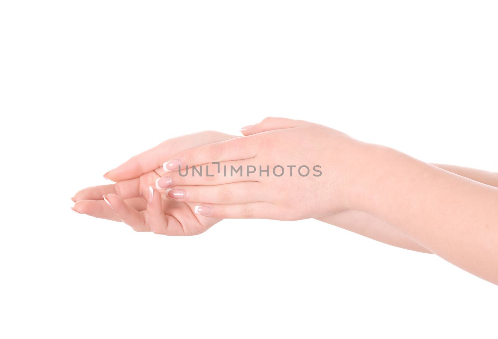 Beautiful woman's hands on white background.