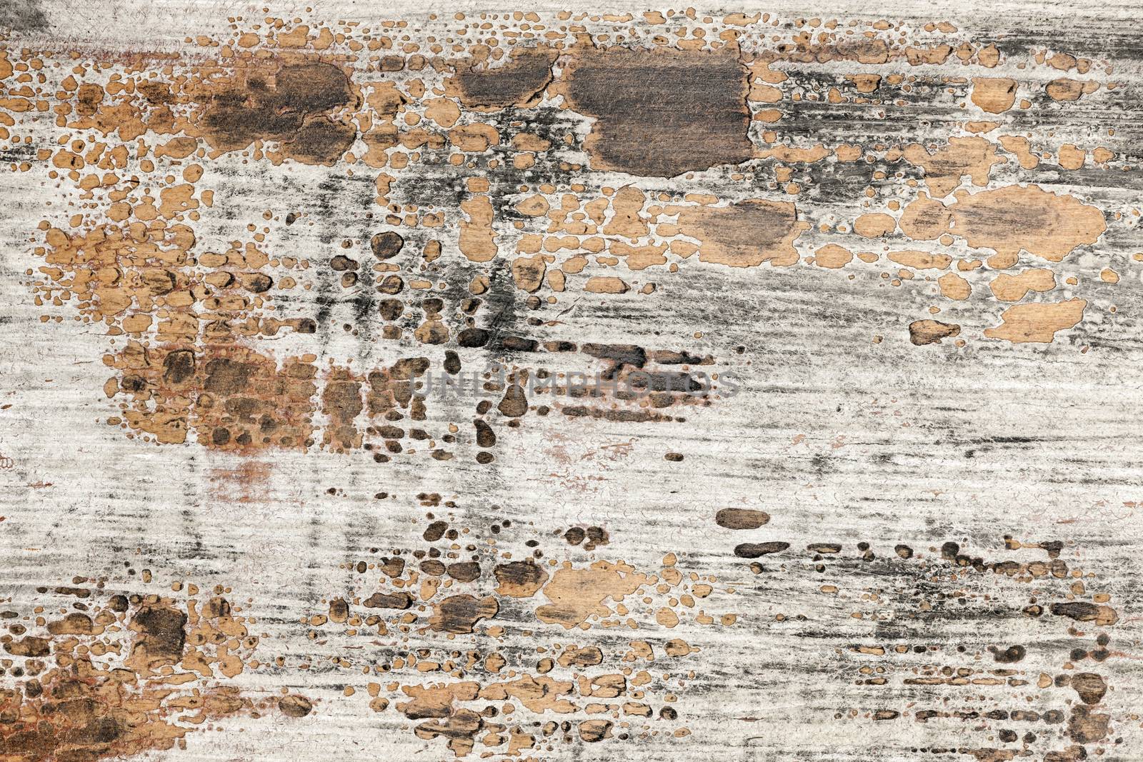 Old weathered chipped painted wood texture as grunge background