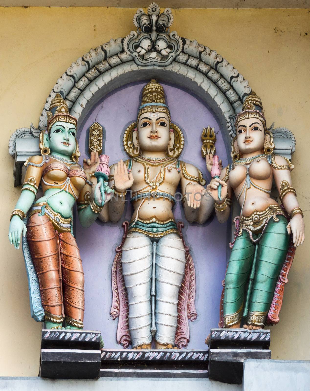 Lord Murugan and his two wives, Valli and Deivayanai at Rathinagiri Hill Temple in Vellore, Tamil Nadu, India.