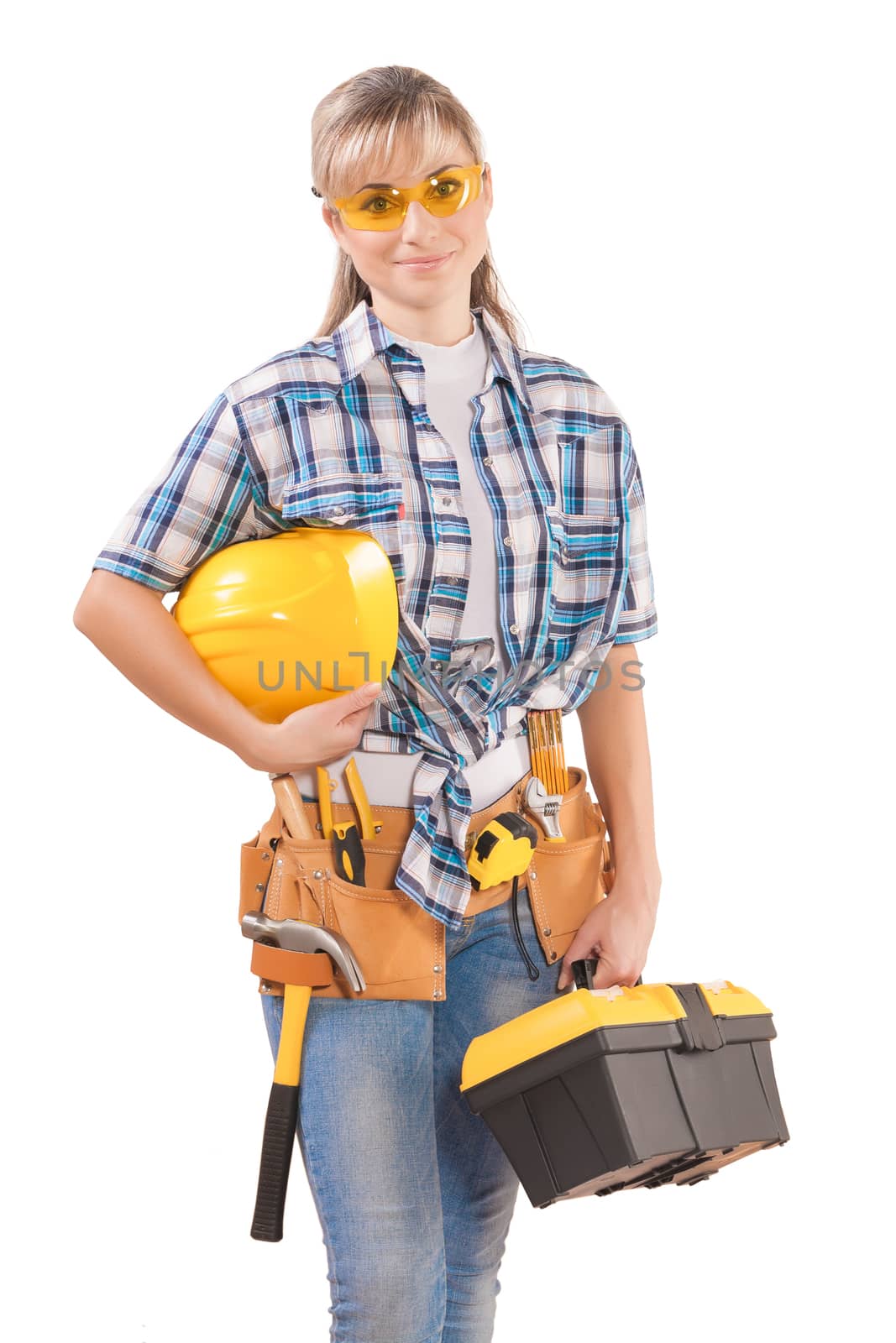 beautiful female wearing working clothes with tools isolated on  by mihalec