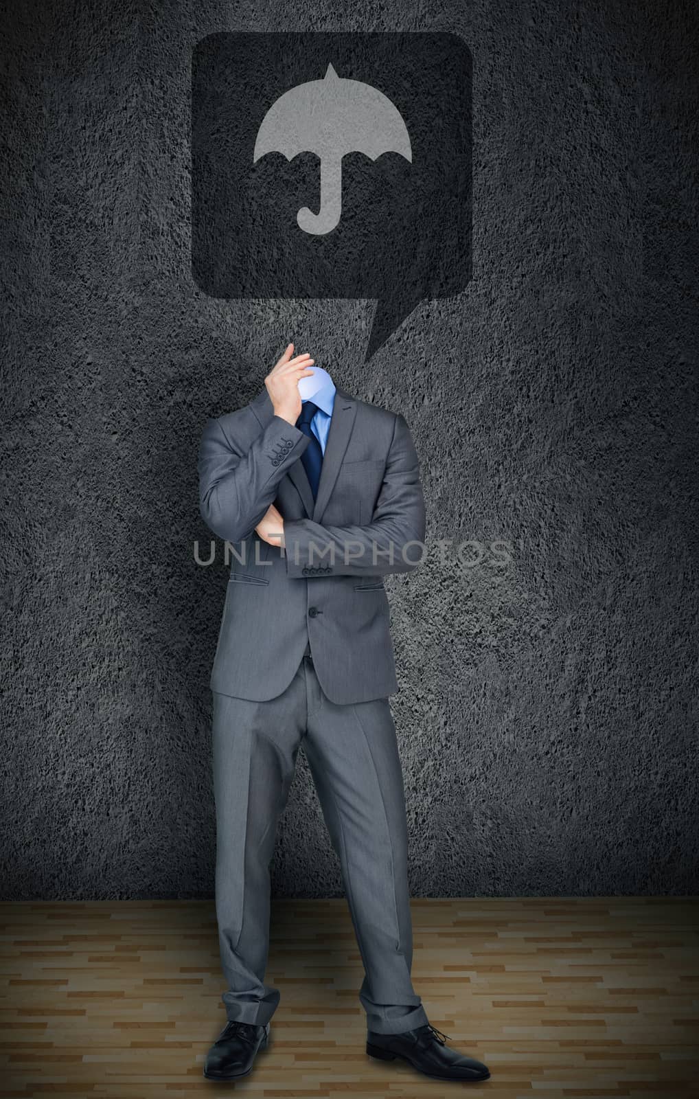 Composite image of headless businessman with umbrella in speech bubble in grey room