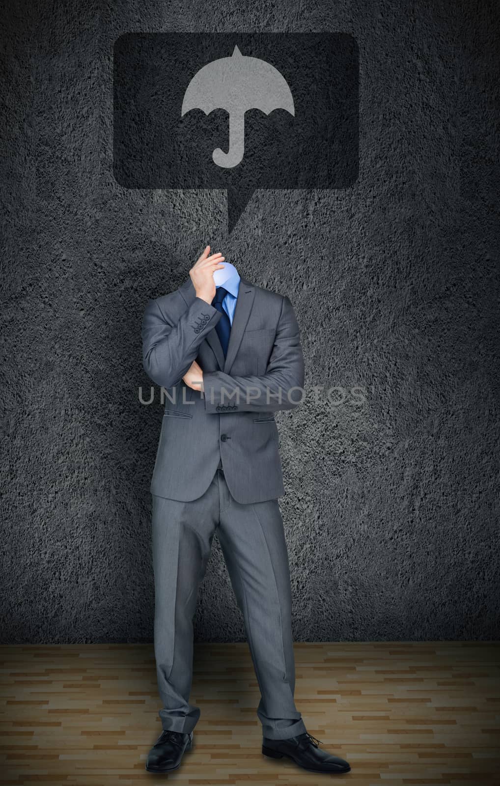 Composite image of headless businessman with umbrella in speech bubble in grey room