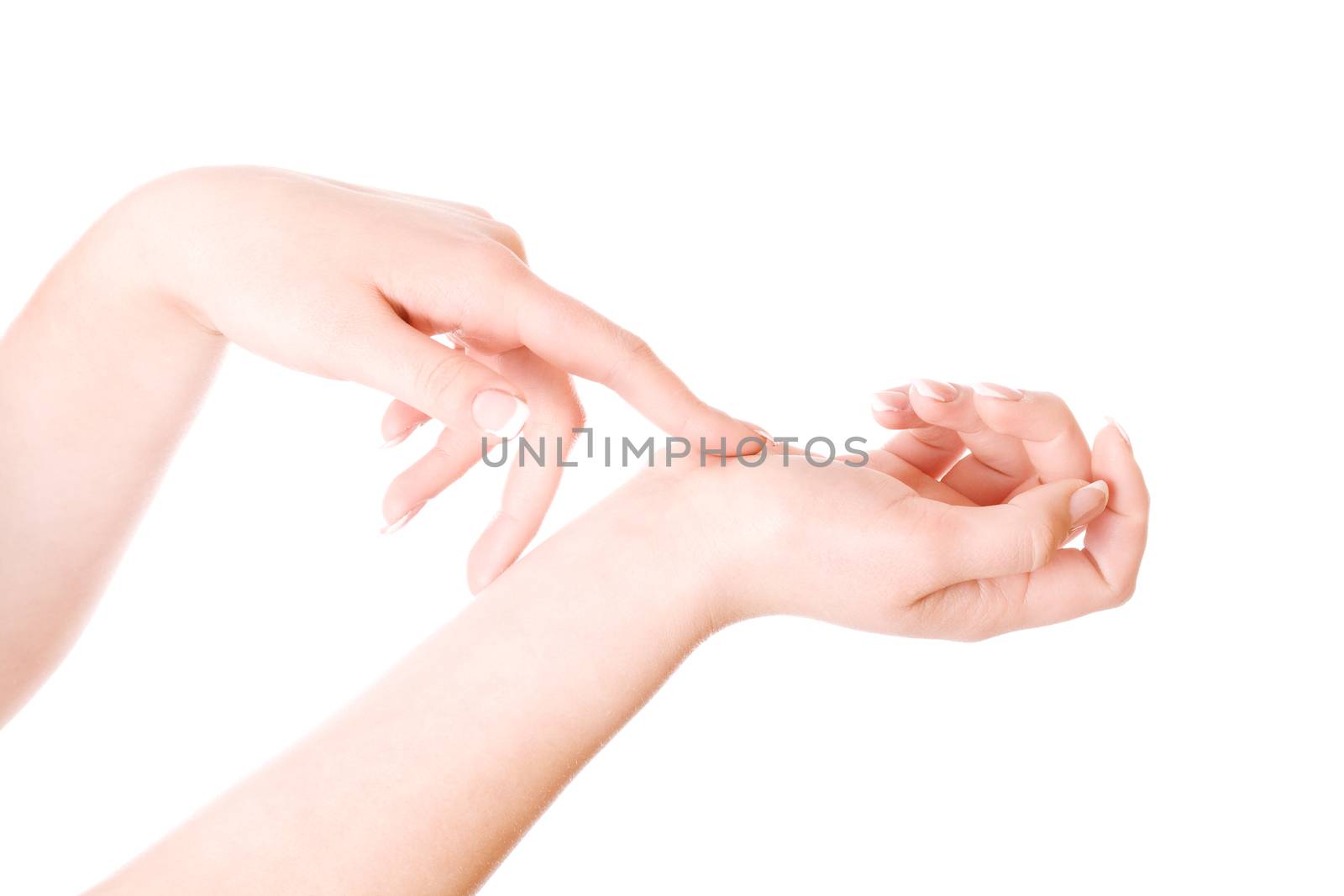 Beauty elegant female hands with french manicure isolated on white.
