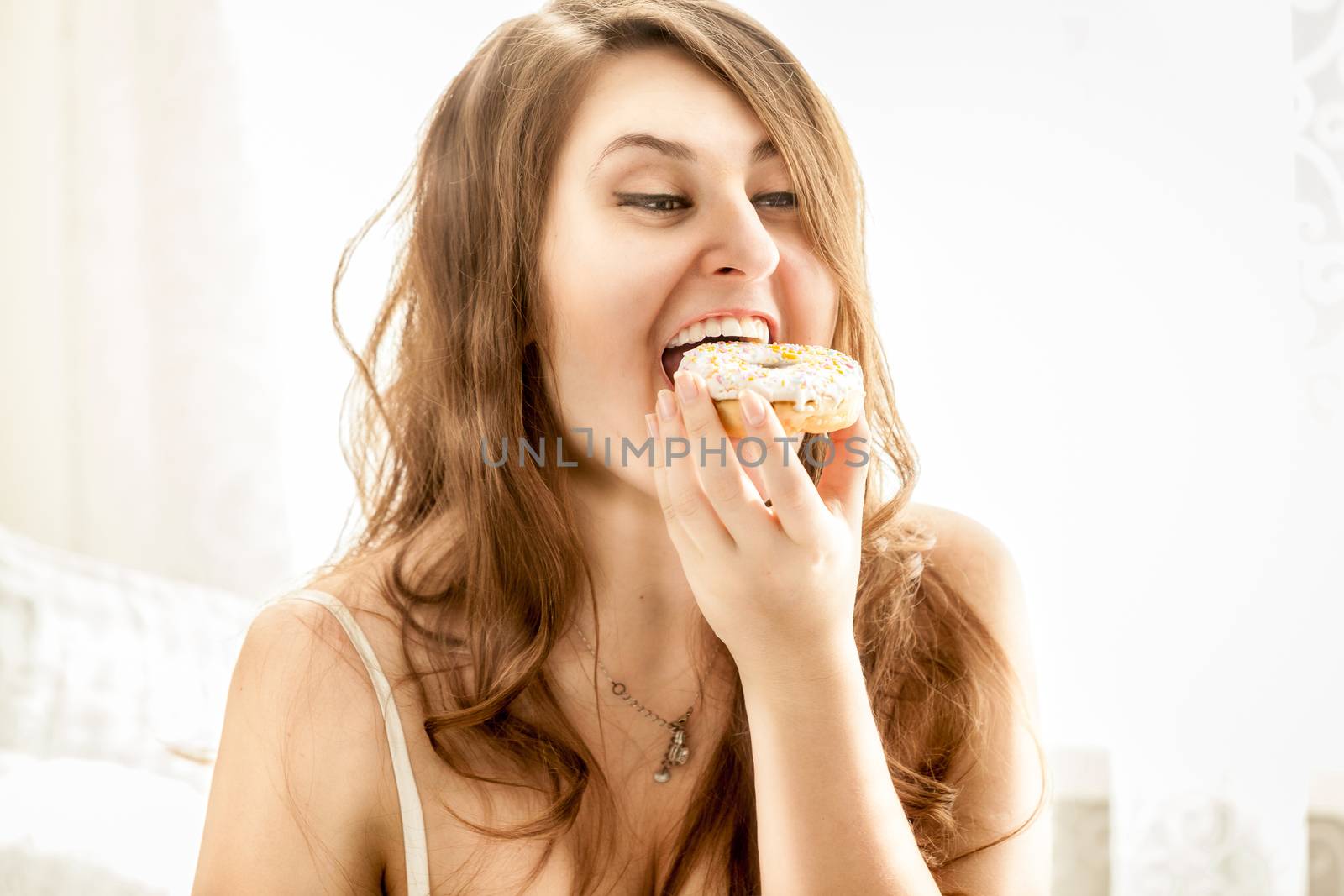 portrait of sexy woman biting big donut by Kryzhov