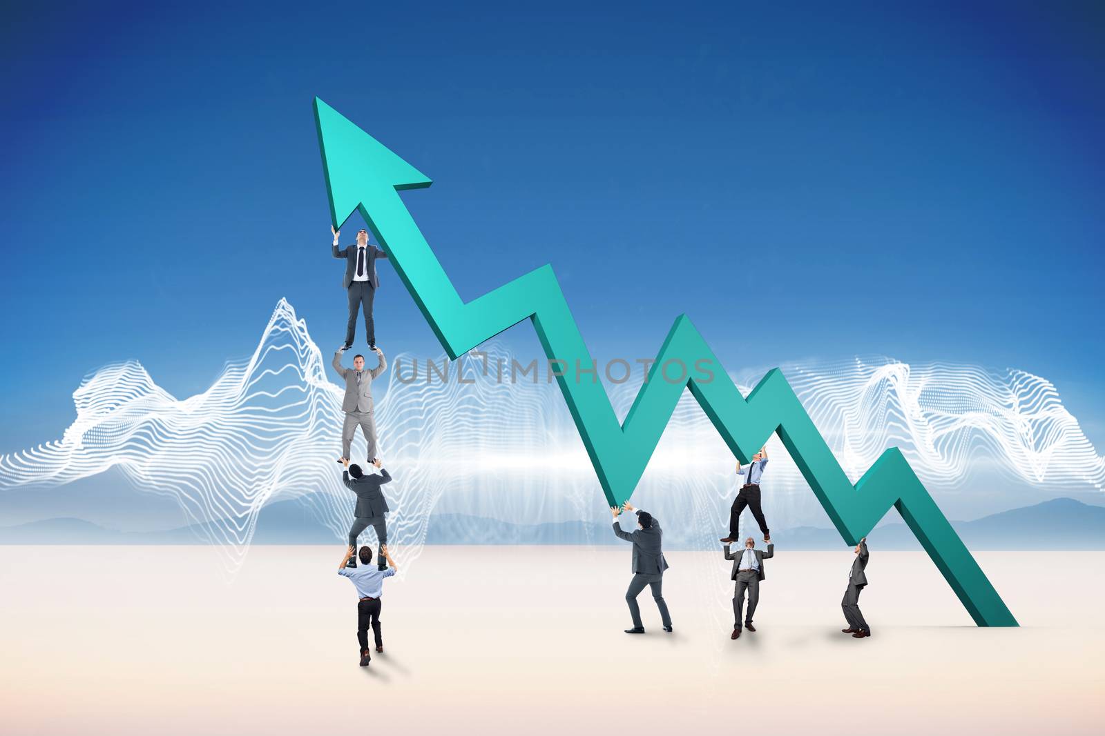 Composite image of business team holding up arrow by Wavebreakmedia