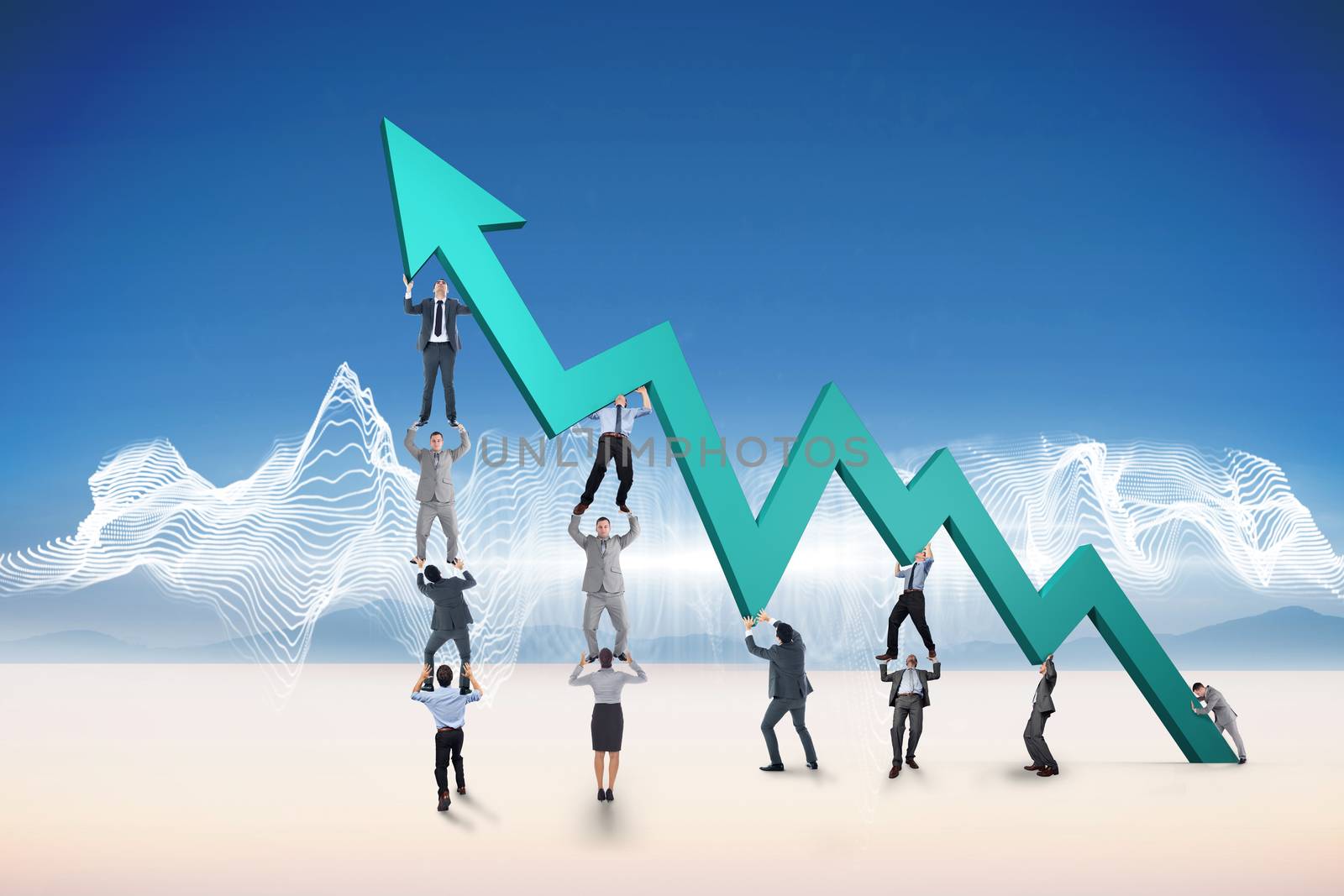 Composite image of business team holding up arrow by Wavebreakmedia