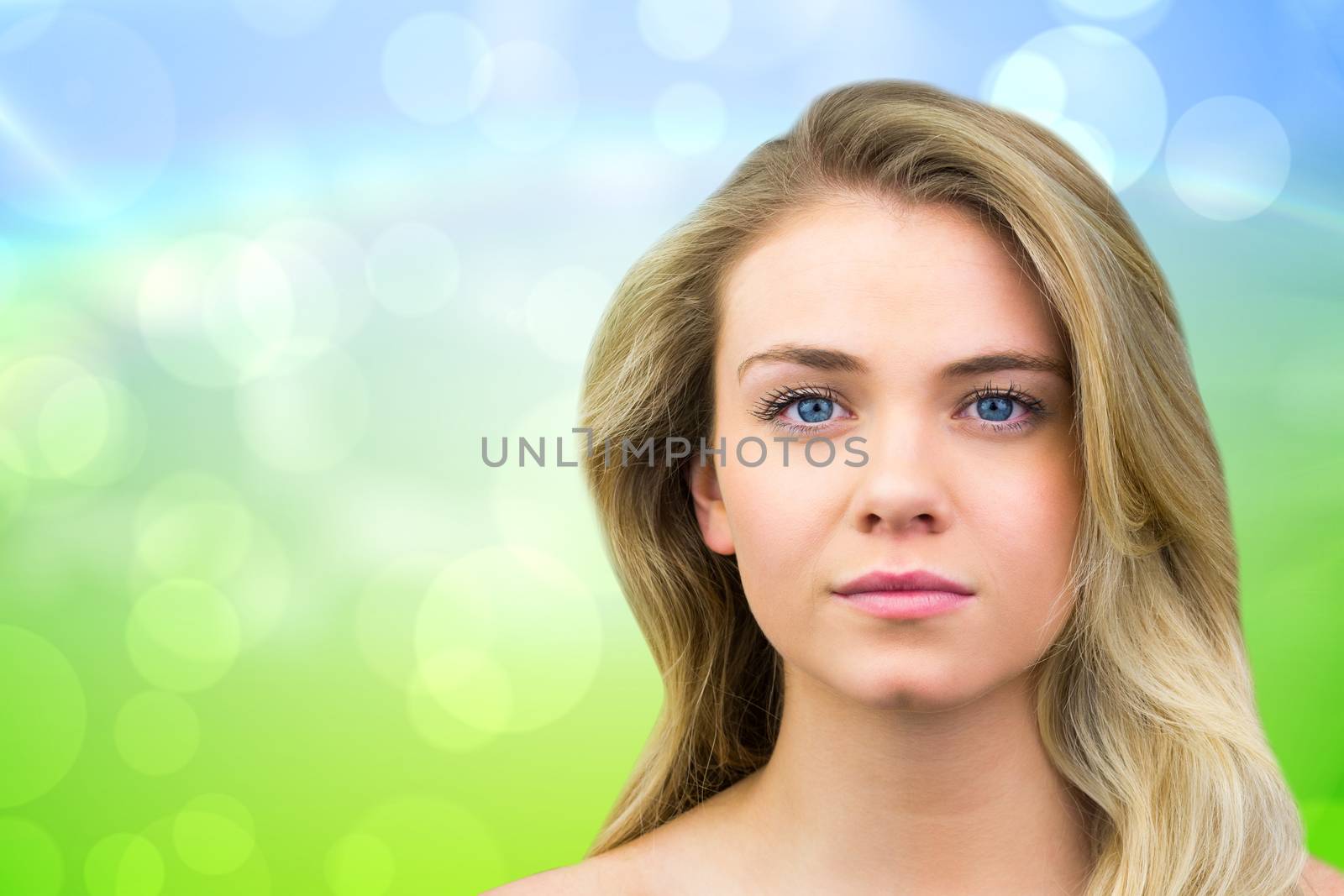 Composite image of serious blonde natural beauty by Wavebreakmedia