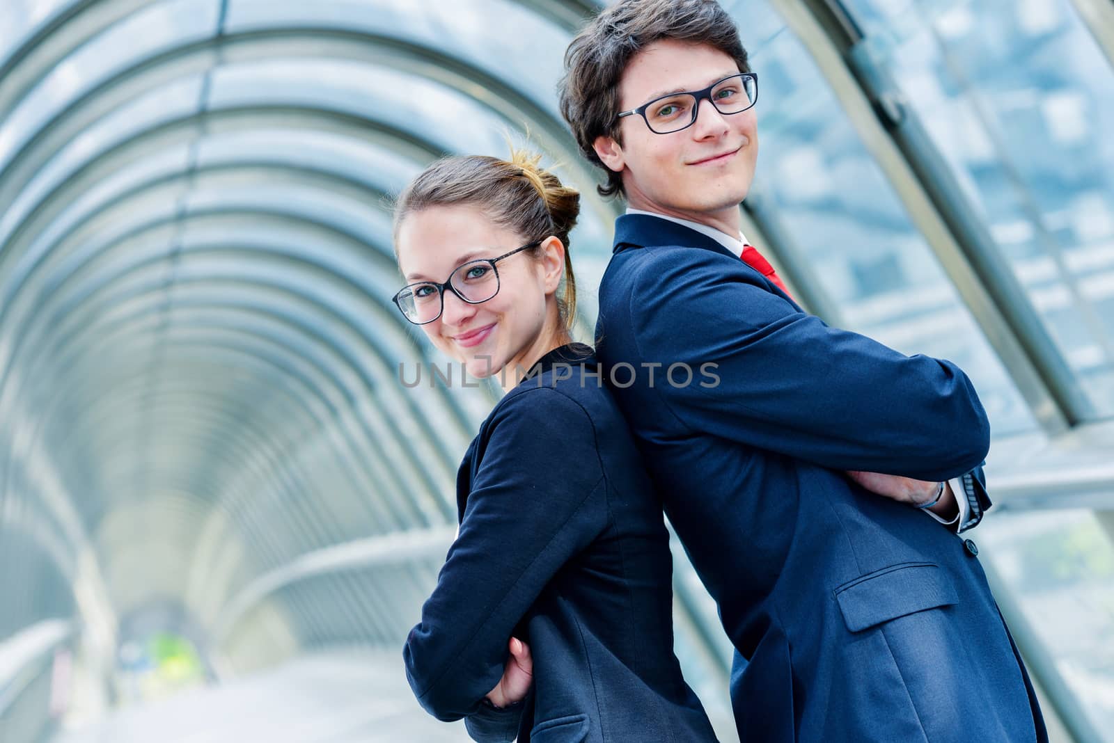 expressive portrait Junior executives of company crossed arms