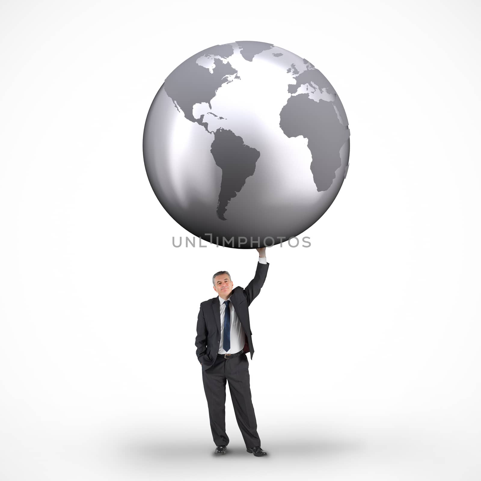 Composite image of businessman holding globe by Wavebreakmedia