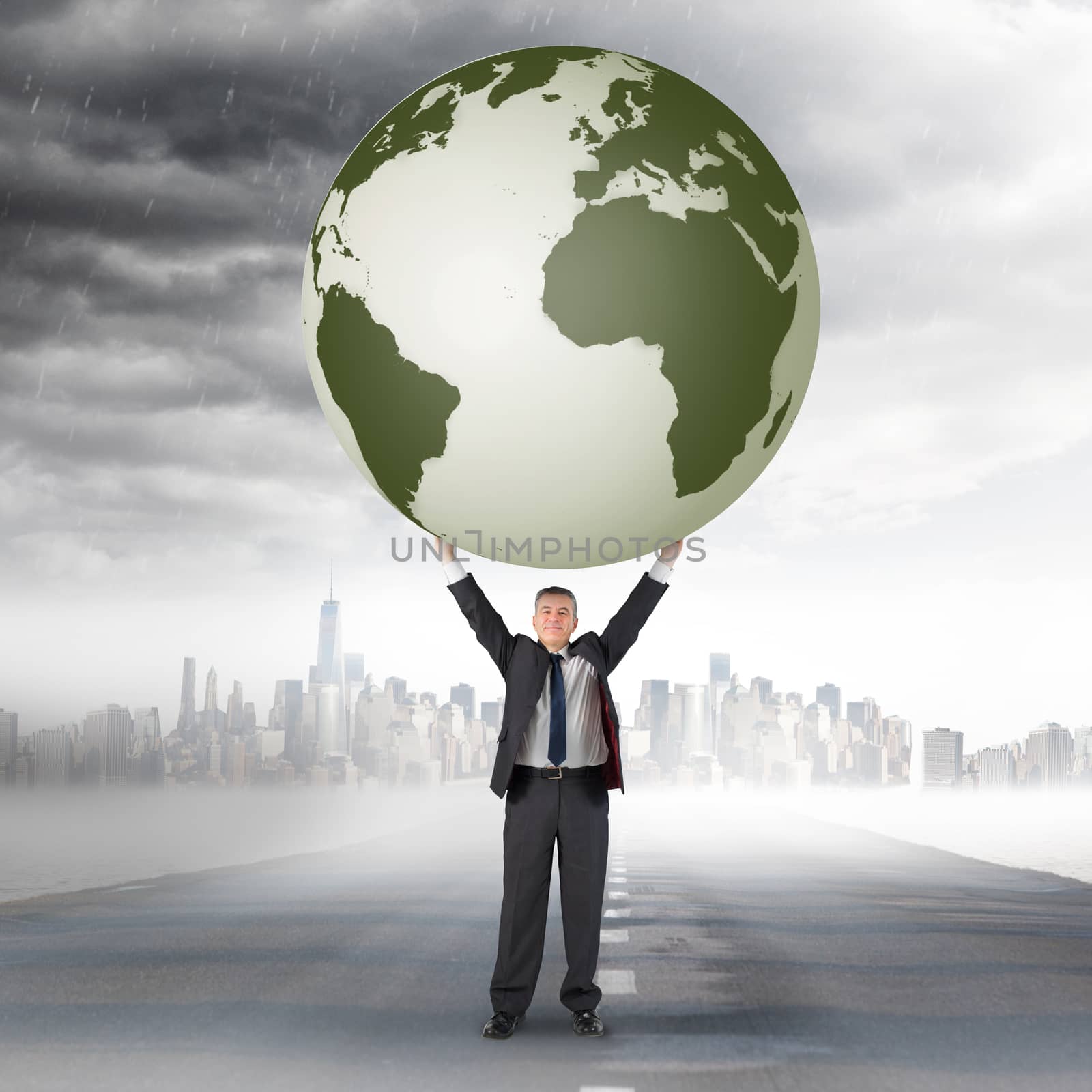 Composite image of businessman holding earth by Wavebreakmedia