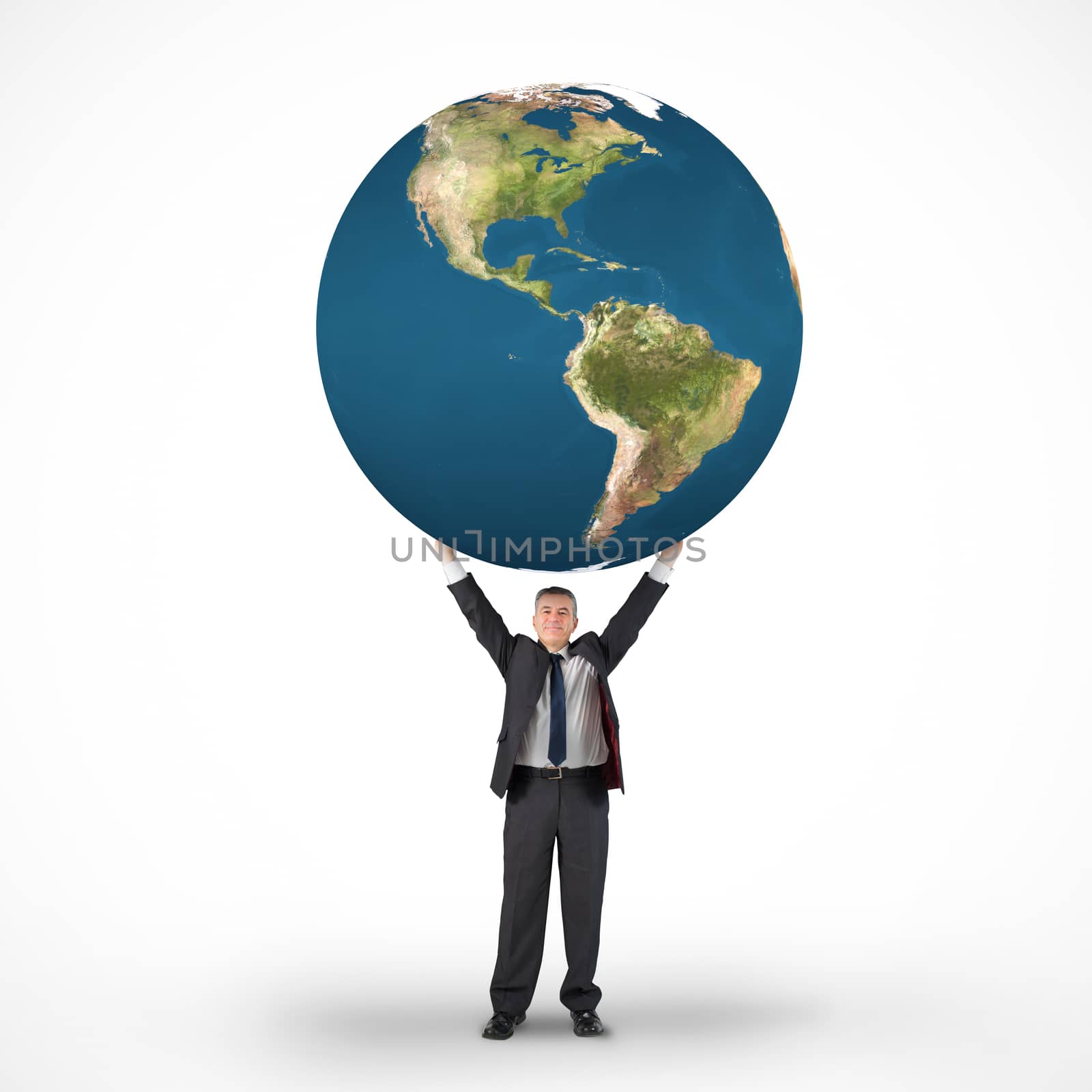 Composite image of mature businessman holding globe by Wavebreakmedia