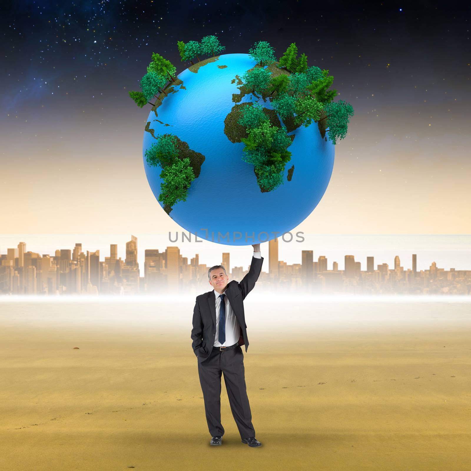 Composite image of businessman holding earth by Wavebreakmedia