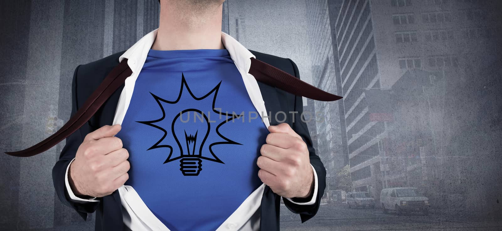 Composite image of businessman opening his shirt superhero style by Wavebreakmedia