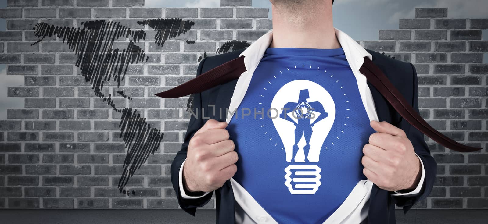 Composite image of businessman opening his shirt superhero style by Wavebreakmedia