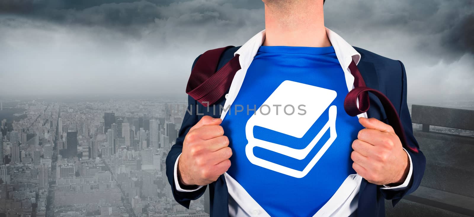 Composite image of businessman opening his shirt superhero style against gloomy city