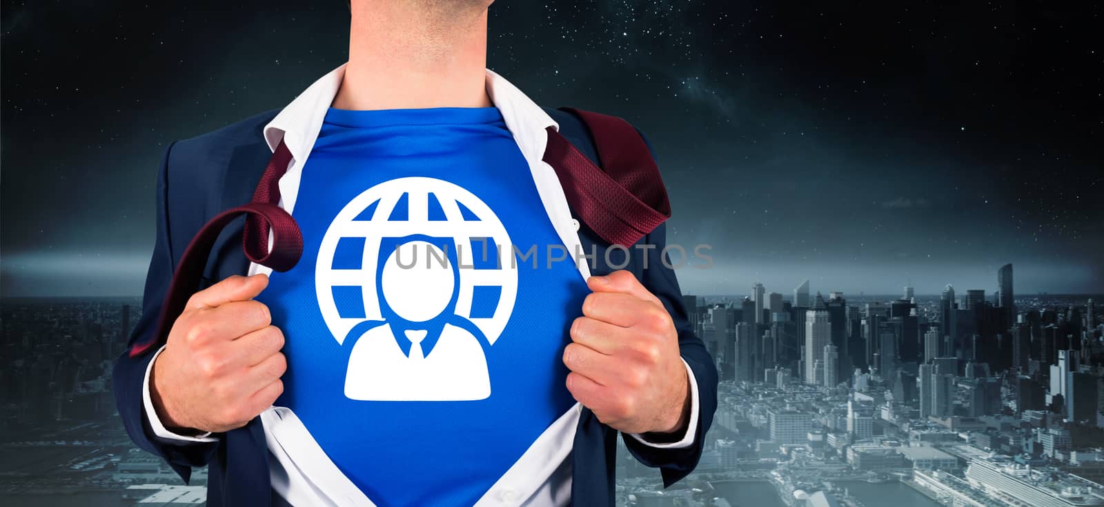 Composite image of businessman opening his shirt superhero style by Wavebreakmedia