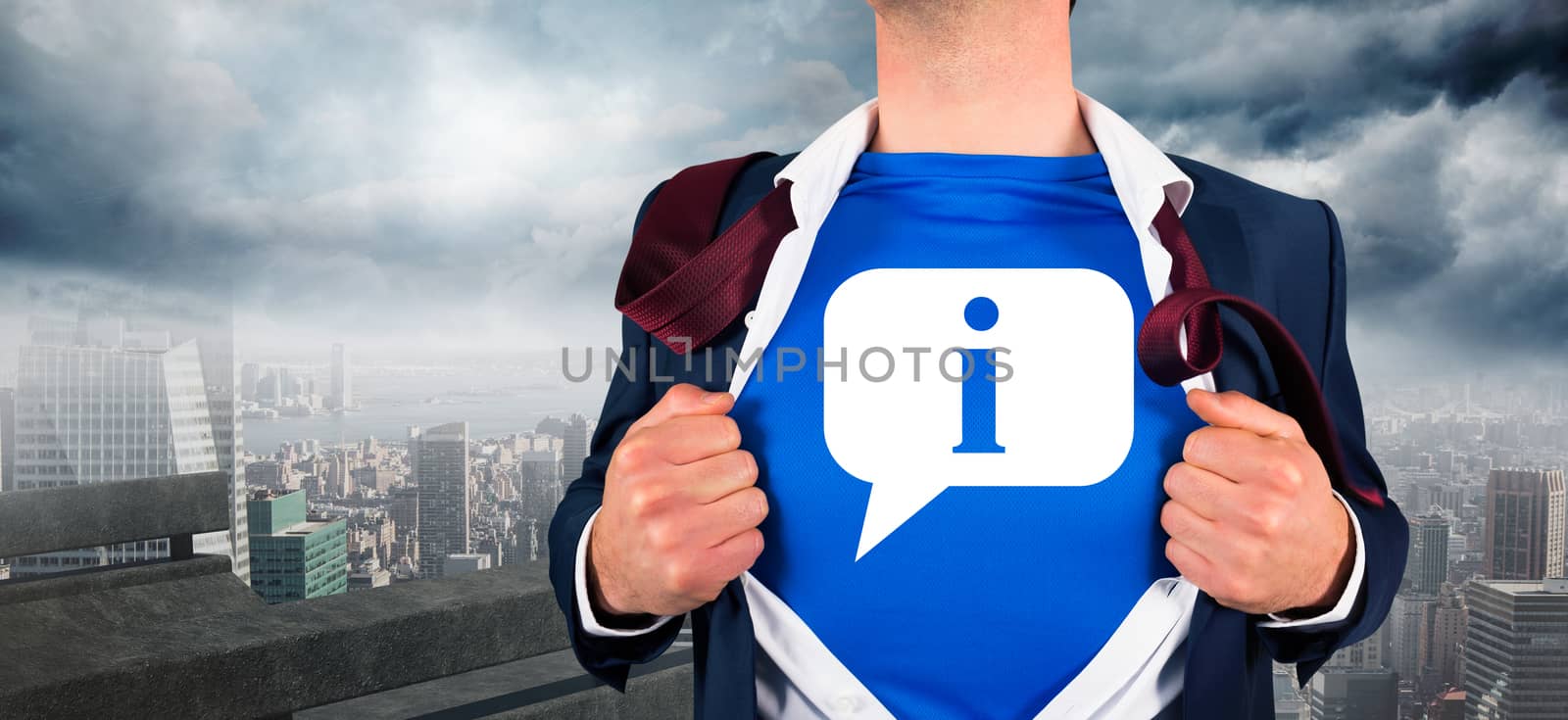 Composite image of businessman opening his shirt superhero style by Wavebreakmedia
