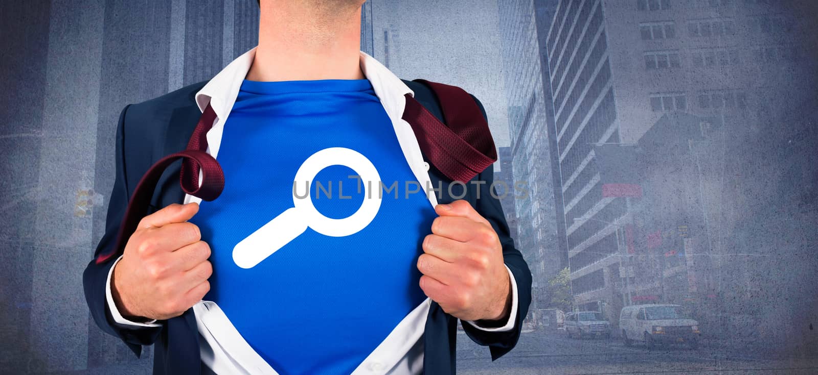 Composite image of businessman opening his shirt superhero style by Wavebreakmedia