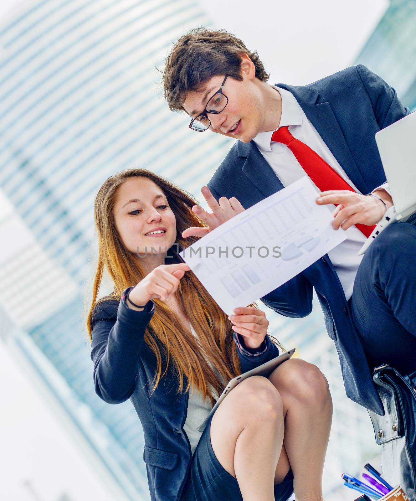 Junior executives dynamics working outside of their office by pixinoo