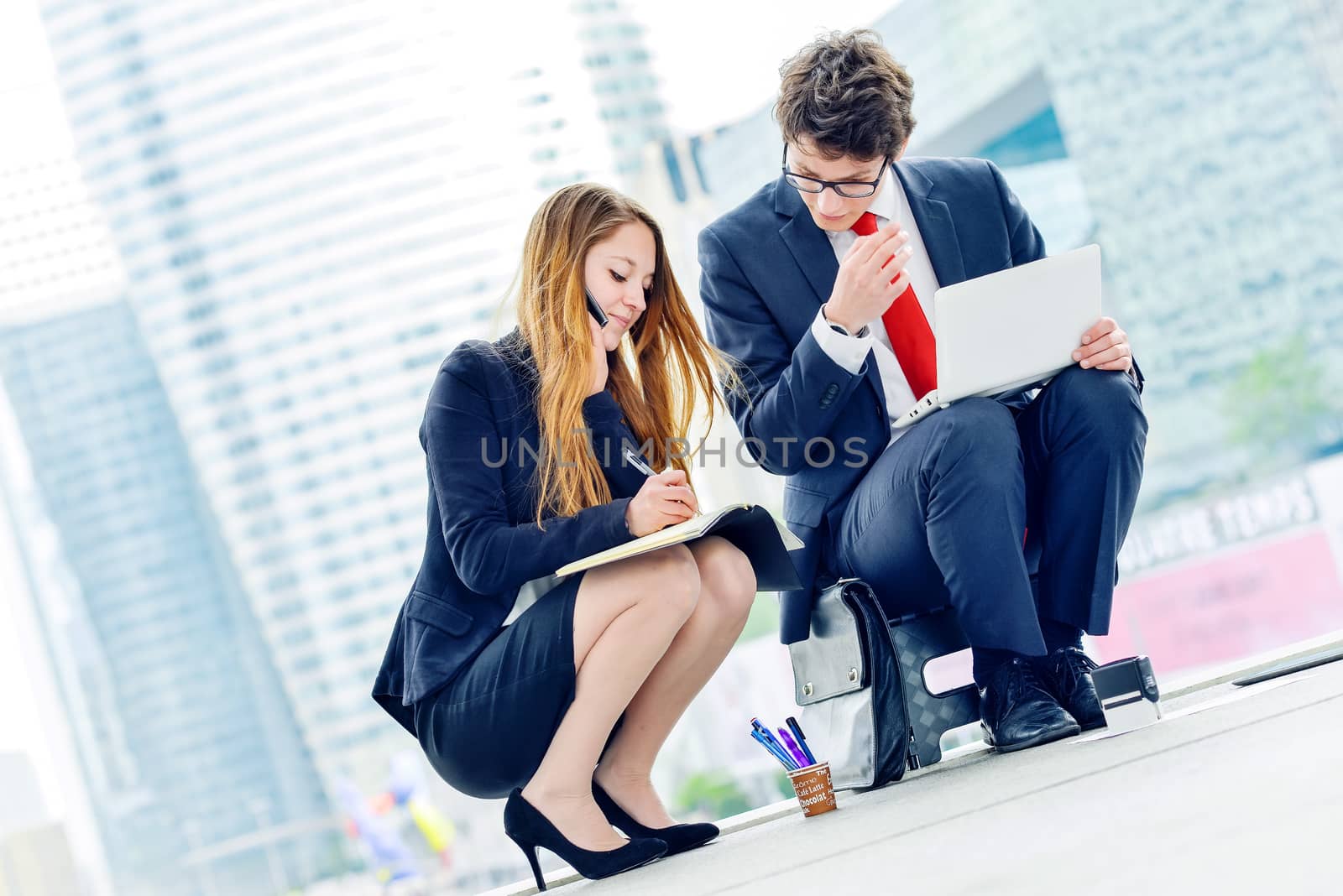 Junior executives dynamics working outside of their office by pixinoo