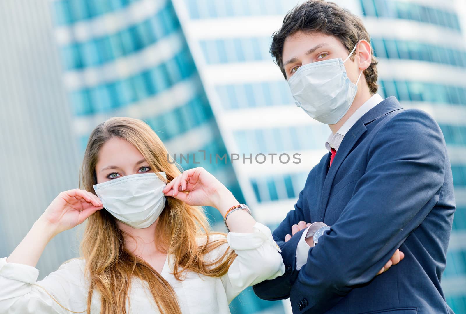 Junior executives dynamics  wearing protective face mask against pollution