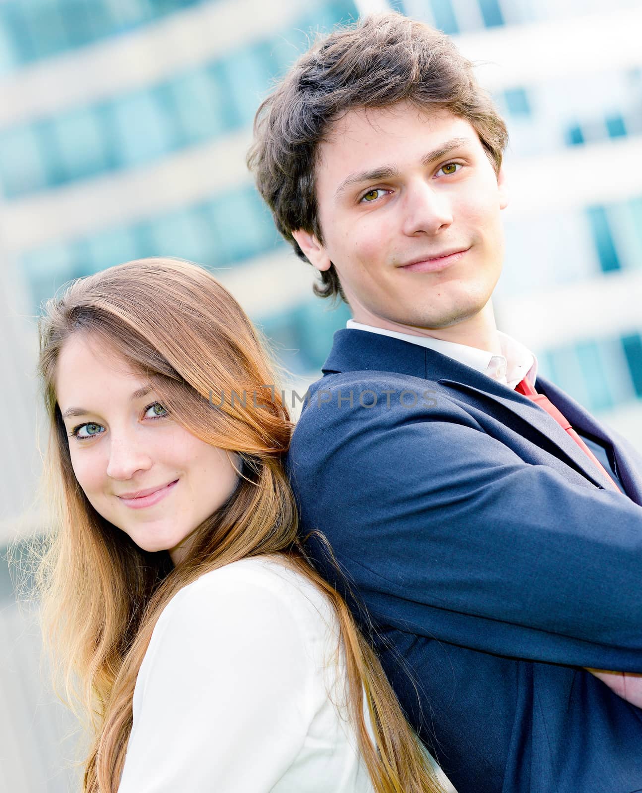 expressive portrait Junior executives of company crossed arms by pixinoo