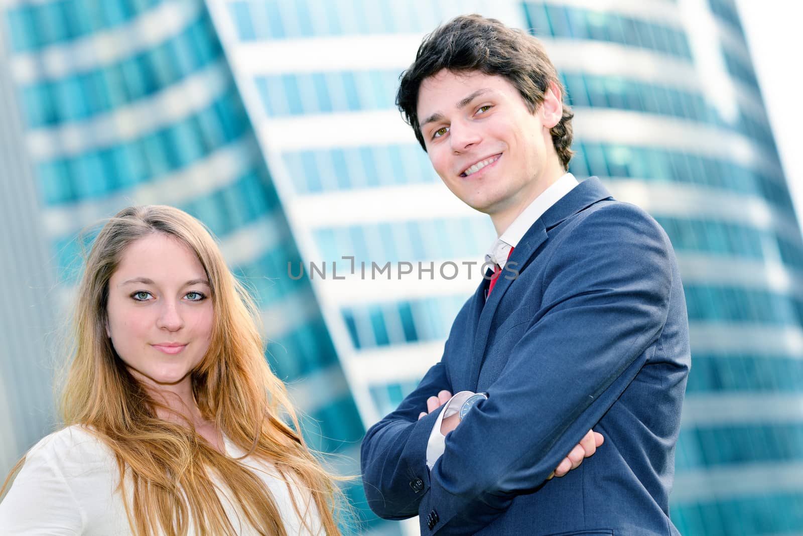 expressive portrait Junior executives of company crossed arms