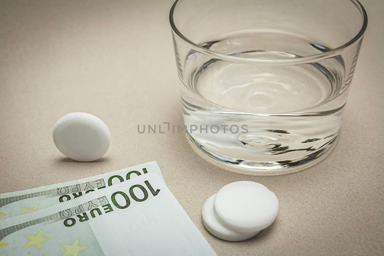 effervescent tablets and glass with water  by digicomphoto