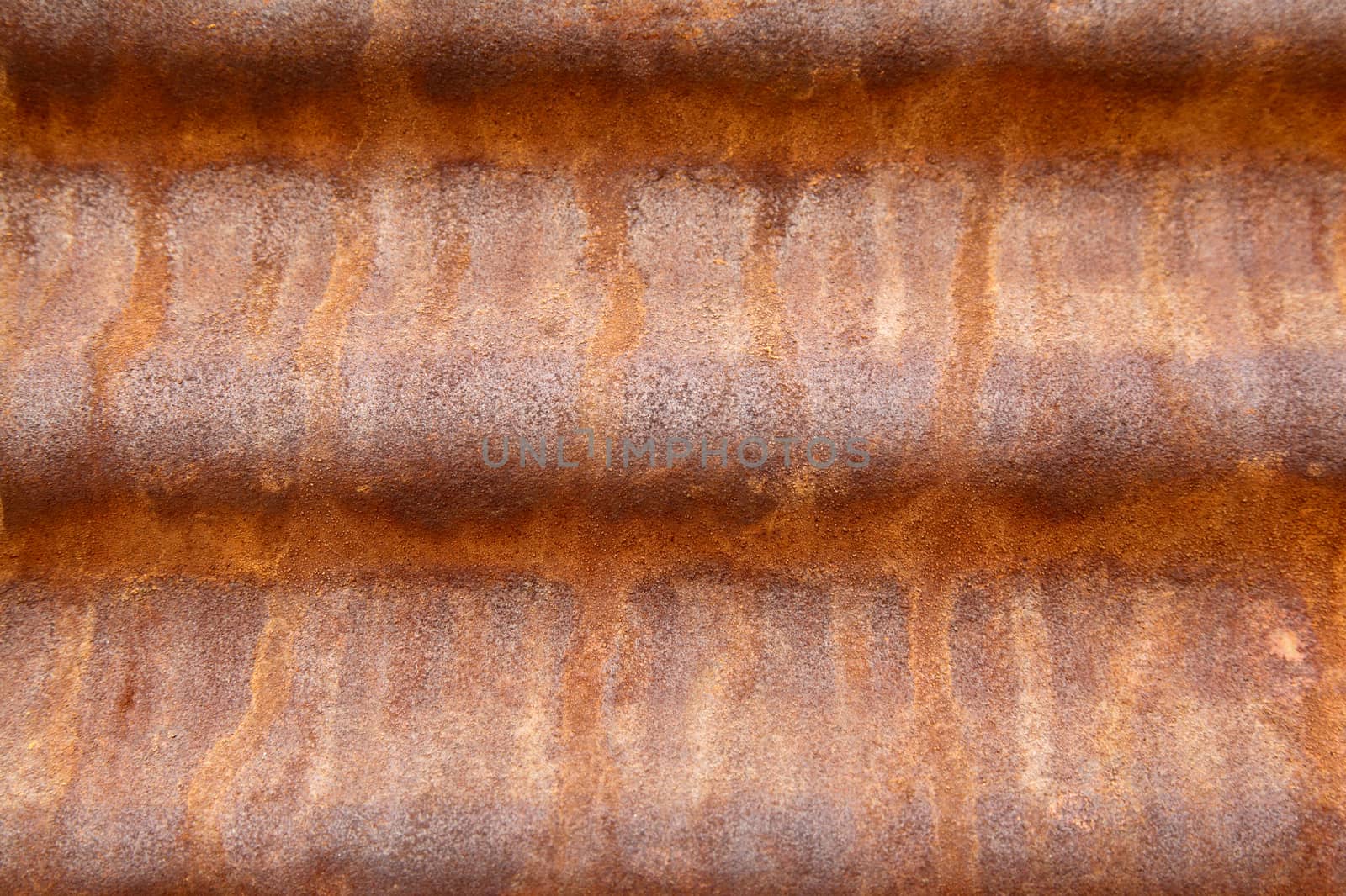 Horizontal strips of iron with rust