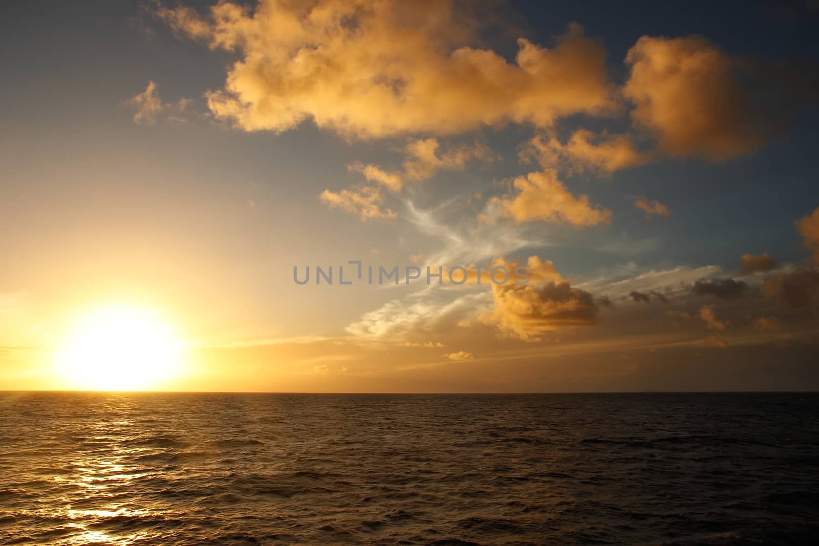 Sunset over the ocean, Vanua Levu island, Fiji by donya_nedomam