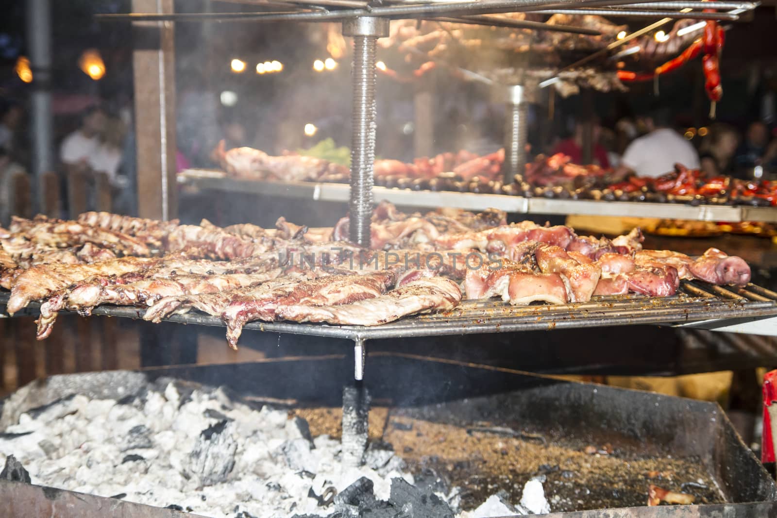 batch of meat in medieval barbecue, Spain by FernandoCortes