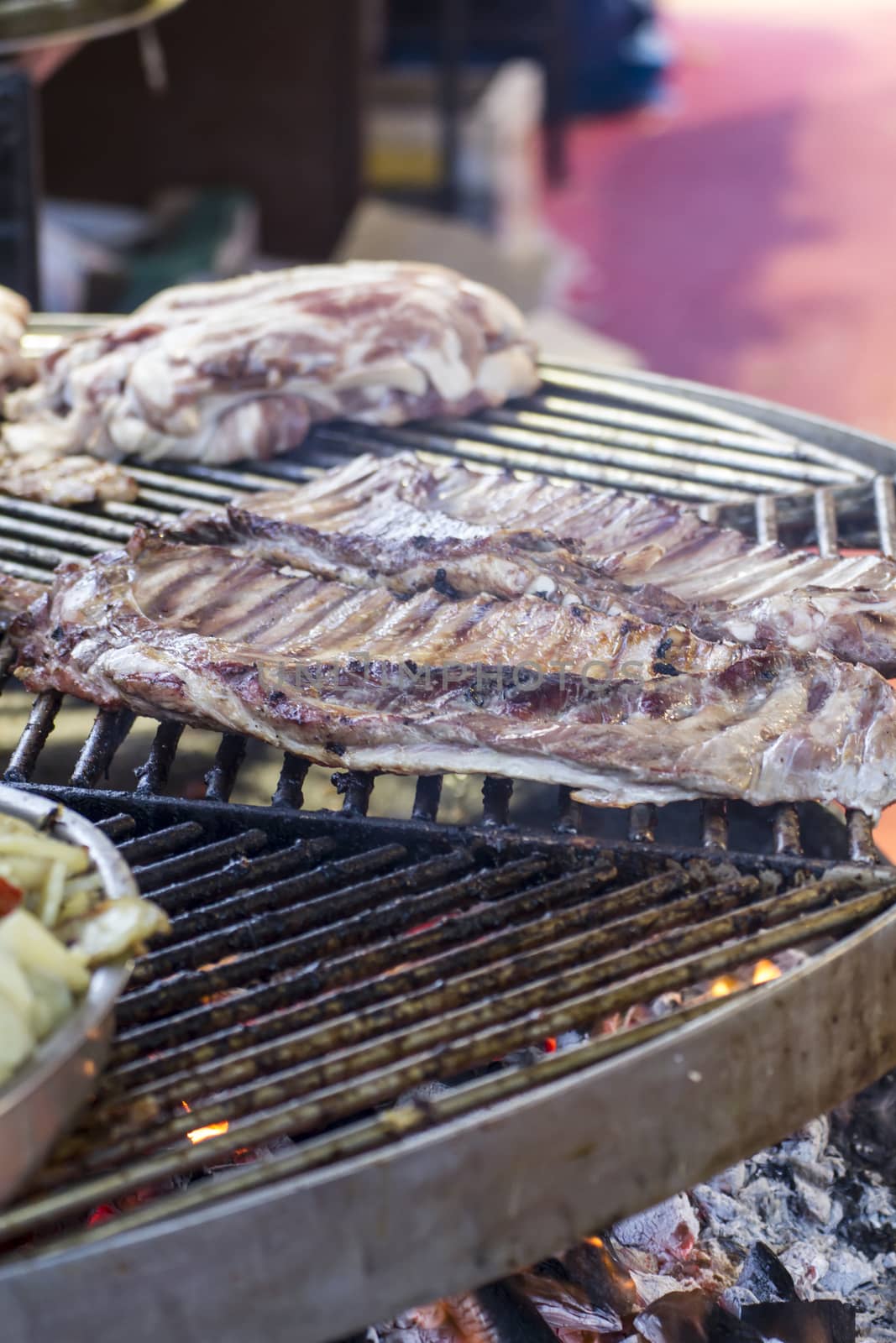 grilled, barbecue with sausages and lamb in a medieval fair, Spain