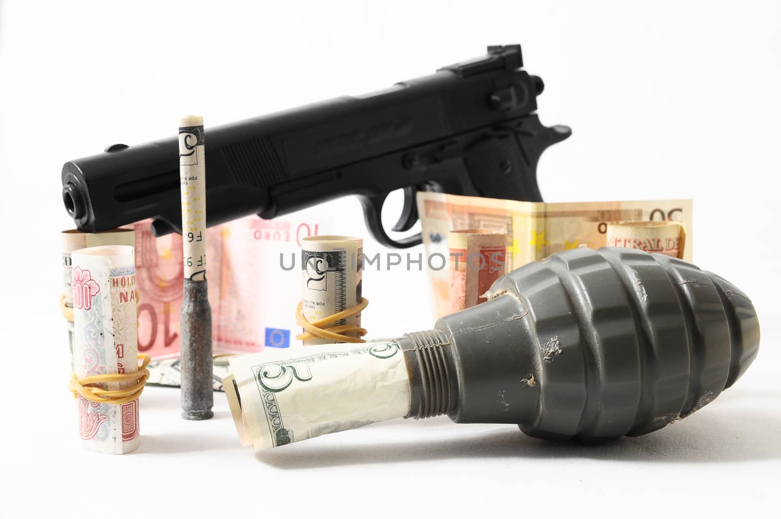 Money and Weapons Concep on a White Background